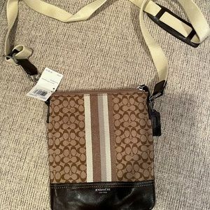 Coach cross body purse New with Tags. Must Sell